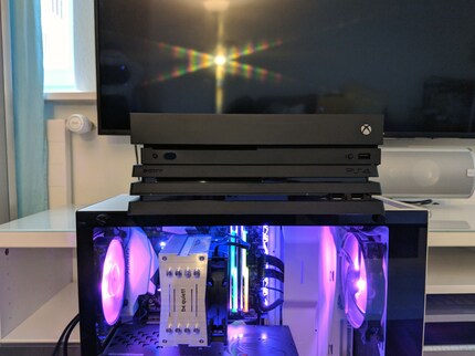 The Xbox One X compared with a PS4 Pro and my PC.