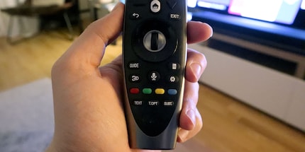 This is the microphone button on the remote. Why don’t you give it a go?