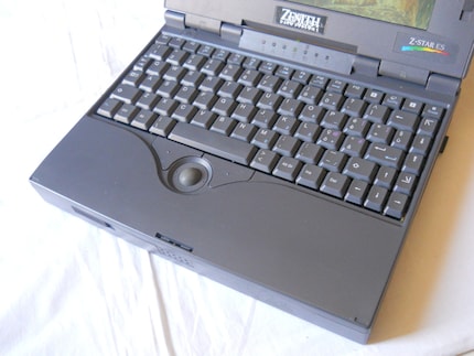 QWERTY keyboard and trackball mouse.