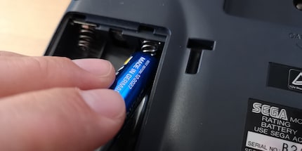 Inserting batteries is part of everyday life with the Sega Game Gear.
