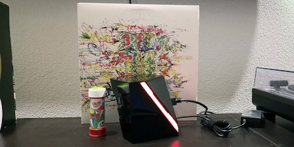 The box compared in size with things I have lying around.