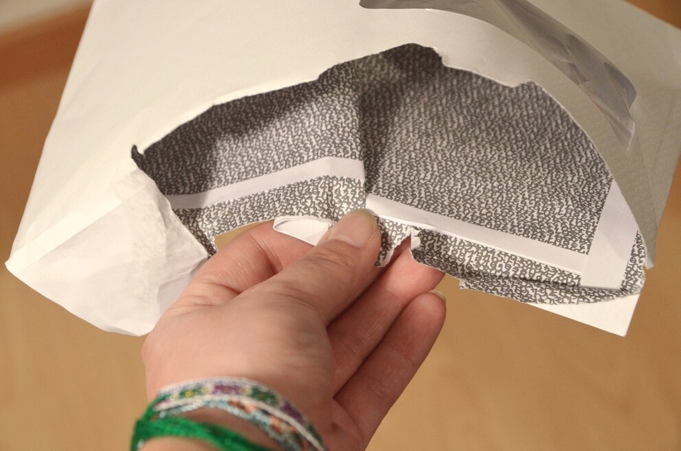 Die Faltung muss keinem Origami-Kranich gleichen, sondern einfach überlappen.