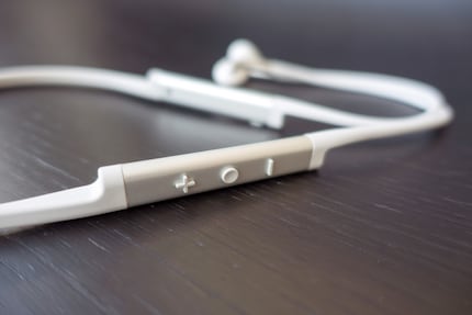 The buttons for volume up, volume down and pause.