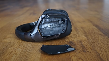 You can stow the wifi adapter behind the cover.