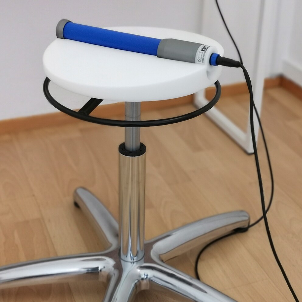 Der Sensor auf dem Stuhl misst die Muskelkontraktionen meines Beckenbodens.