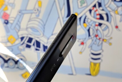 The Alert Slider on the Side.