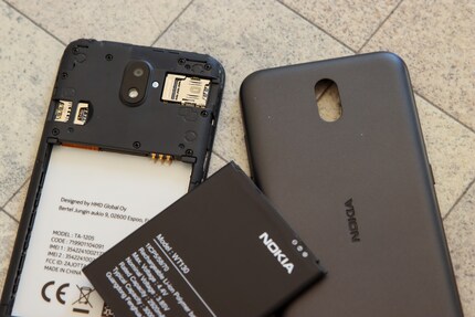 Take off the back and remove the battery.