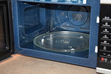 The interior is coated with blue ceramic enamel for easy cleaning.