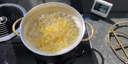 The potato sticks seem to be enjoying their hot bath.