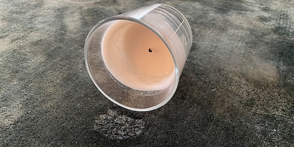 Blotting paper gets rid of wax stains.