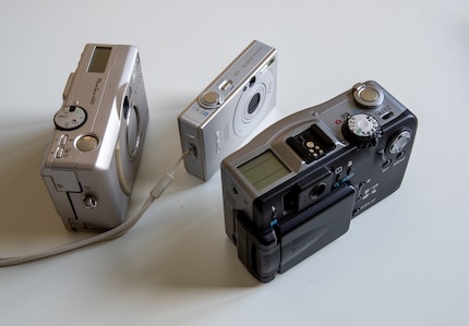 From left to right: Canon PowerShot A50, Ixus 70 and PowerShot G1