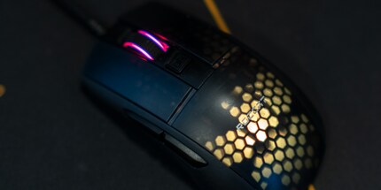 The Burst Pro has two lighting zones: on the scroll wheel and under the honeycomb structure.