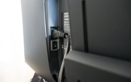 The power supply is integrated into the monitor.