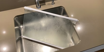 You can either clean the shelves in the wash basin or the dishwasher.