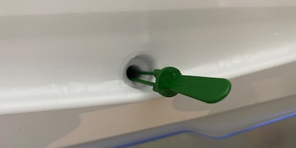 You always want to keep the outlet on the fridge wall free from crumbs and any other deposits so condensation can drain out.
