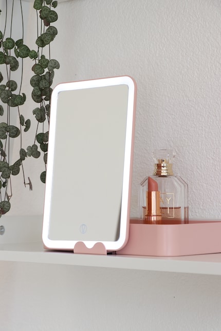 A mirror with multiple jobs.