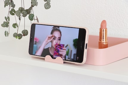 I can prop up my phone instead of the mirror and watch makeup tutorials.