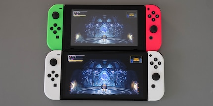 Above the 2019 Switch, below the Switch OLED playing «Metroid Dread».