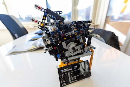 The engine block with fully working three-speed transmission.