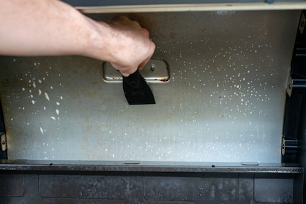 Liberate the inside of the hood from years of old food splatter.