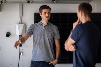Hans Fischer usually charges his electric VW ID.4 at the wall box in his garage at home.