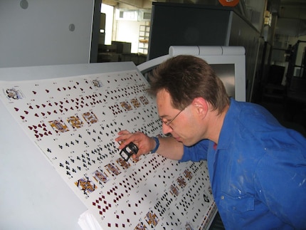 The prints are carefully scrutinised.