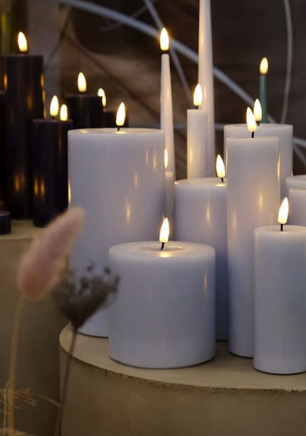 Teamwork: as a group, LED pillar candles do an even better job of fooling you that they’re real.