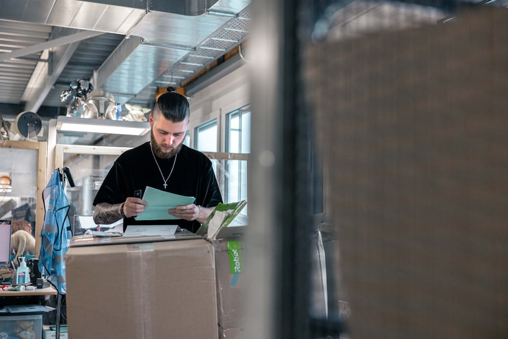 An After Sales Department employee checks a return.