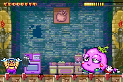 Wacky enemies, like this eggplant monster (?) are part and parcel in Wario Land games.