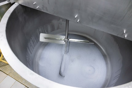 The vats are thoroughly cleaned between production runs.