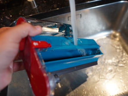You can wash off the entire attachment, including the roller, very easily.