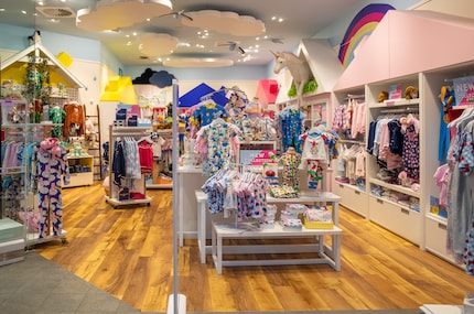 Pink and unicorns: in the clothes department, girls soon understand which colourscape and themes they belong in.