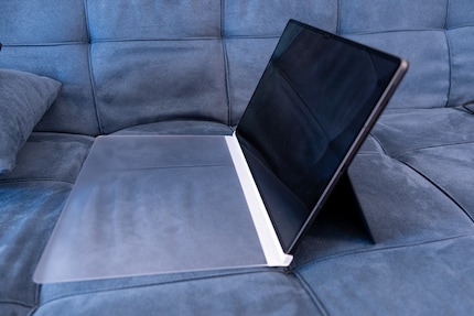 The drawing screen is easy to flip down whenever you want to use the tablet with your fingers.