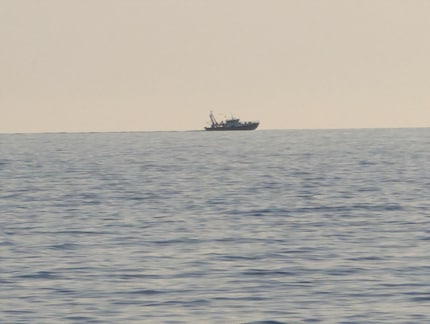 The image quality when using the 30x digital zoom may not be great, but I can see the fishing boat better than with the naked eye.