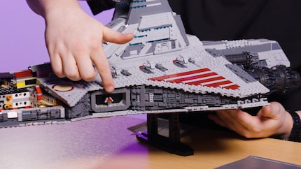 The only hint of interior life is the side entrance to the hangar.