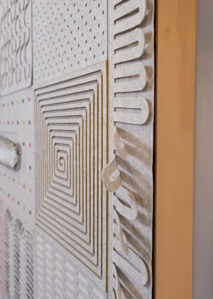 «Touch Me Please» is a wall object made of wool felt that encourages people to explore it.