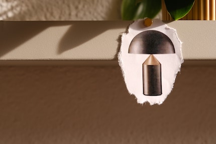 Lichtskulptur: Die pilzförmige Tischleuchte besticht mit zeitlosen geometrischen Formen.
