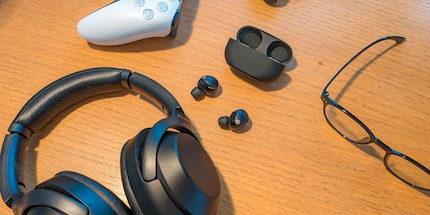 Even Bluetooth headphones with microphones outside the ear cup can’t prevent phone calls from being unintelligible.
