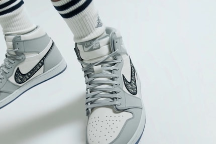 The Dior logo on the Nike logo.