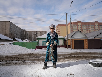An old Kazakh in a traditional dress that young people no longer wear due to globalisation.