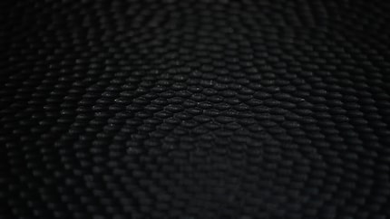 The anti-reflective coating diffuses ambient light. According to Apple, it doesn’t lead to less contrast.