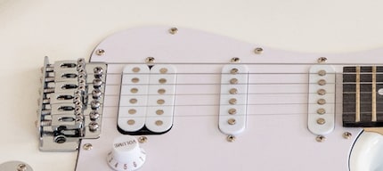 This guitar has a humbucker on the left side (near the bridge) and a single-coil pickup in the middle and on the neck.