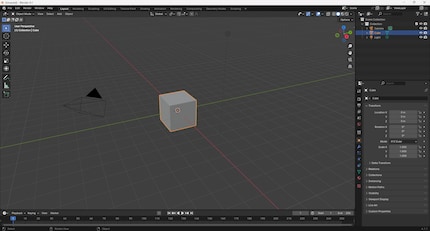 Der Original-Startbildschirm von Blender: Ein Beispiel-Würfel (der default Cube) wartet auf die Bearbeitung. Hilfestellung gibt es nicht.