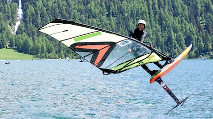Balz Müller won the best of three freestyle contest on the windsurfing board.