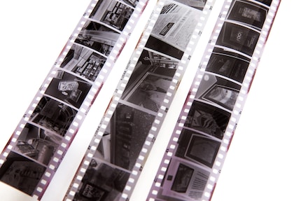 The film strip in the centre is from a normal 35mm camera, to the left and right you can see the half format.