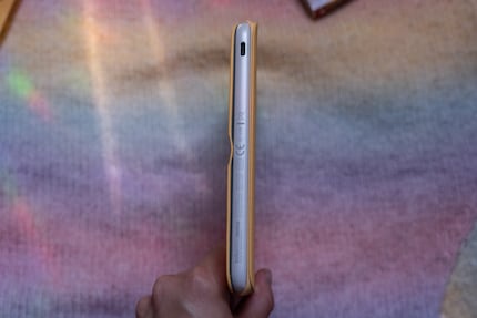 Even with the cover, the e-reader’s just as thick as my thumb.