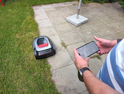 You have to go along the edges manually using your smartphone as a joystick.