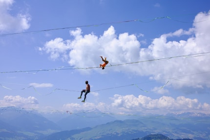 It might look easy, but it’s extremely difficult. Sebastian Egger does a roll on the swaying highline.