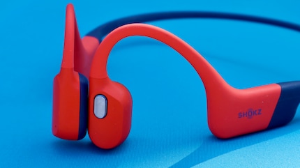 You can use the slightly raised button on the side to answer calls or skip songs and switch between the two modes.