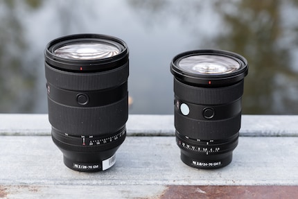 The Sony FE 28-70 mm f/2 GM (left) compared to the Sony FE 24-70 mm f/2.8 GM II.